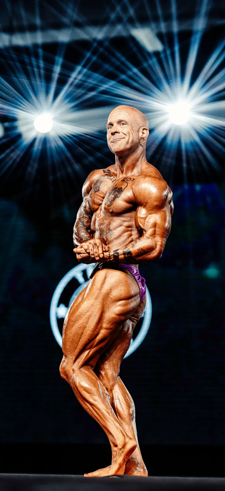 Scott Hall competing on stage at NPC Nationals